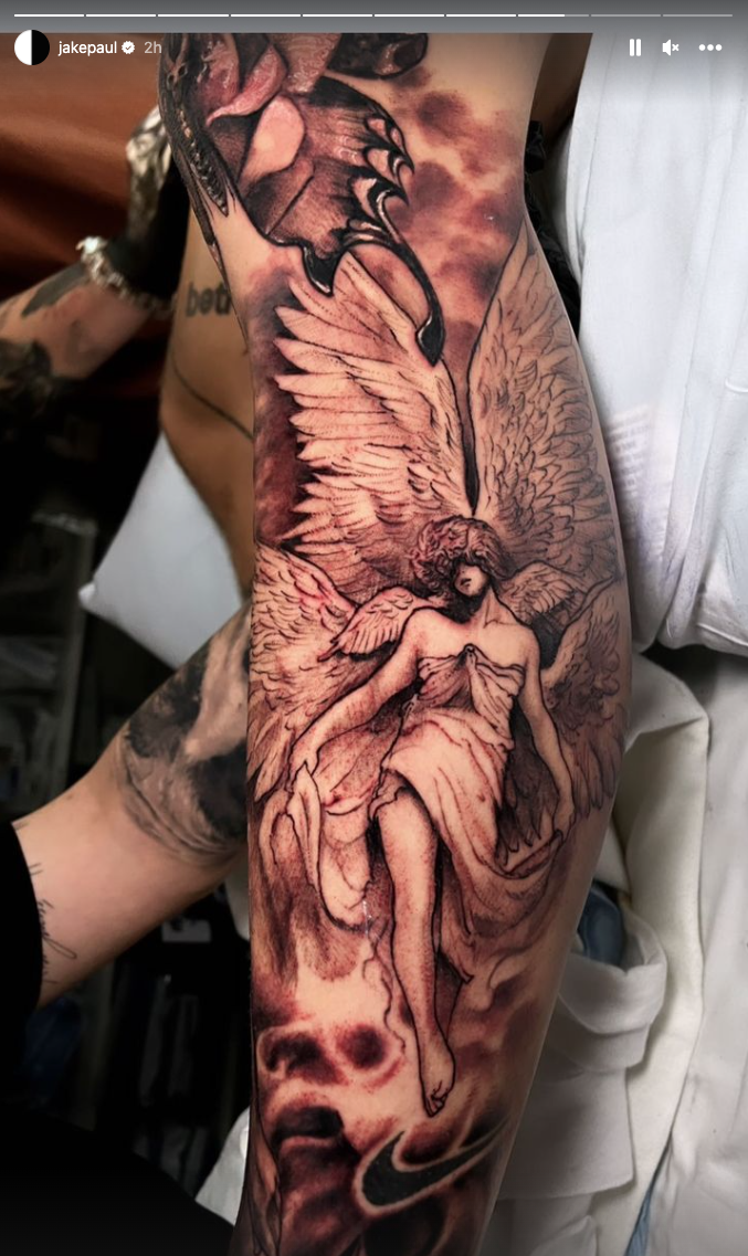 Jake Paul tattoos: Angel sleeve scene and long composition