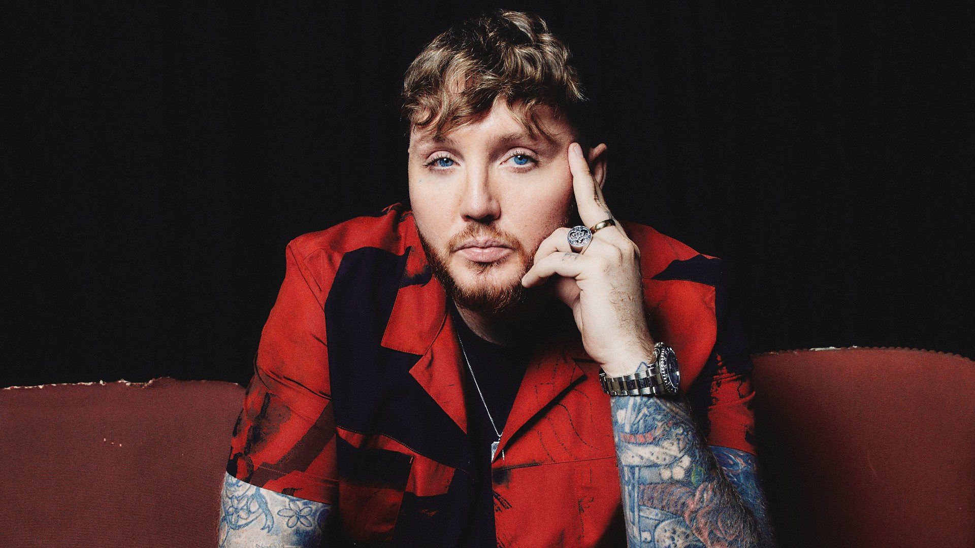 James Arthur tattoos: later portrait view of forearm, hand and the wider public tattoo look