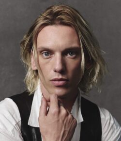 Jamie Campbell Bower Tattoos: Skull, Heart, Finger Ink and Bob Dylan Lettering