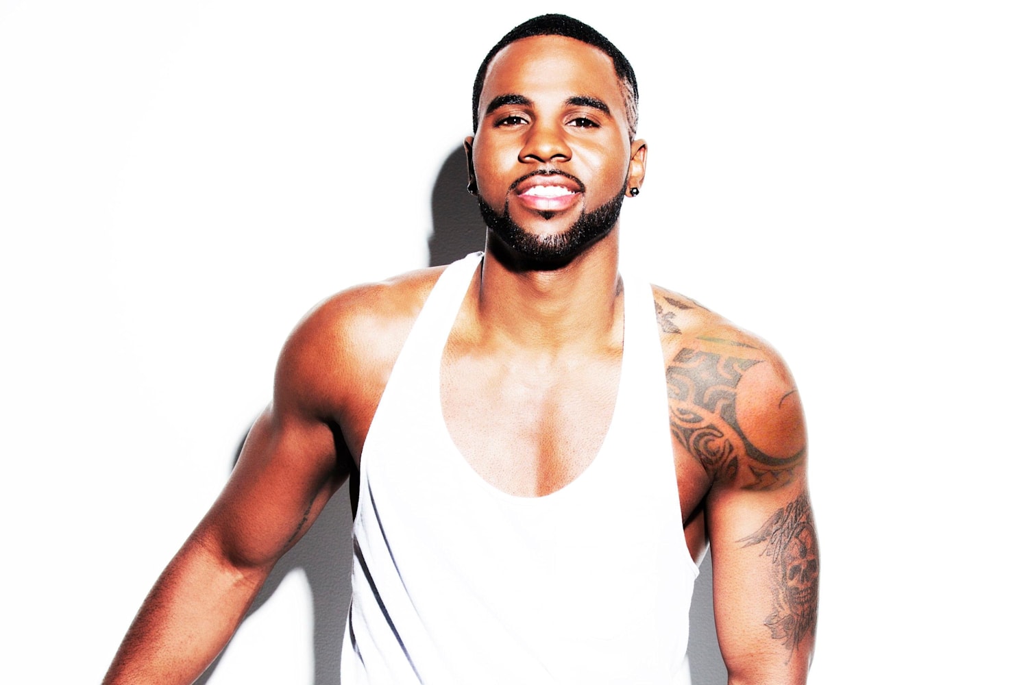 Jason Derulo shoulder and arm tattoos