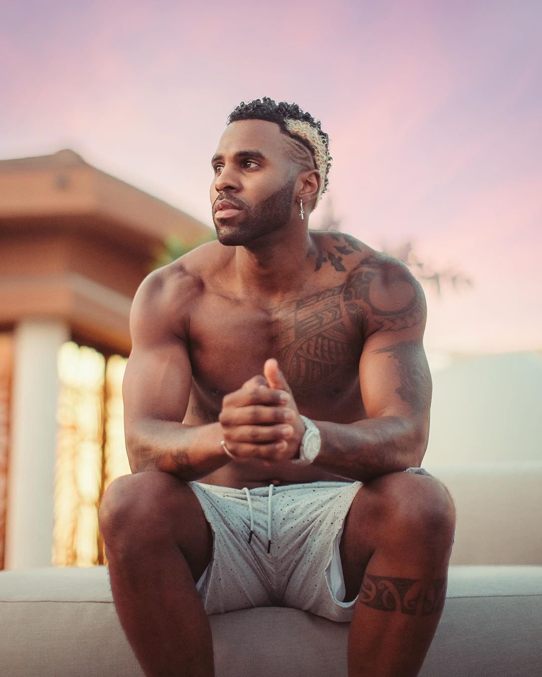Jason Derulo shoulder arm and neck tattoos