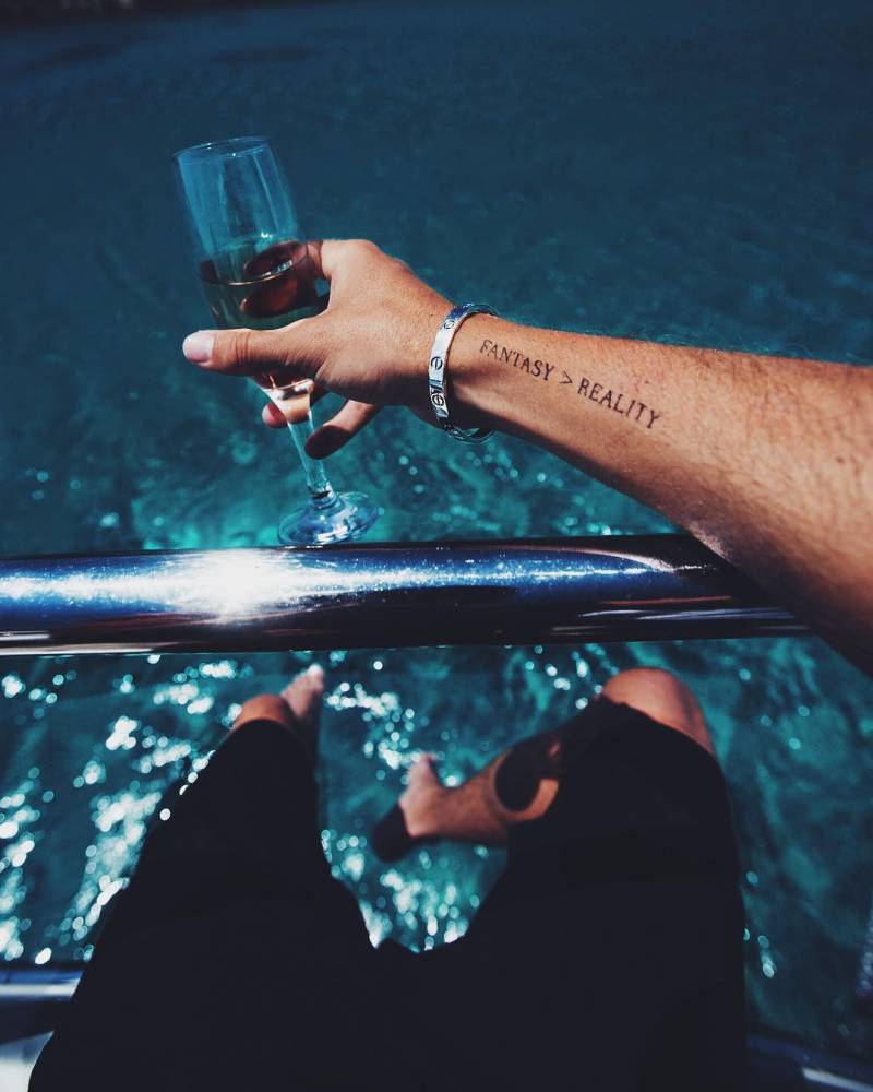 Jay Alvarrez Fantasy greater than Reality forearm tattoo