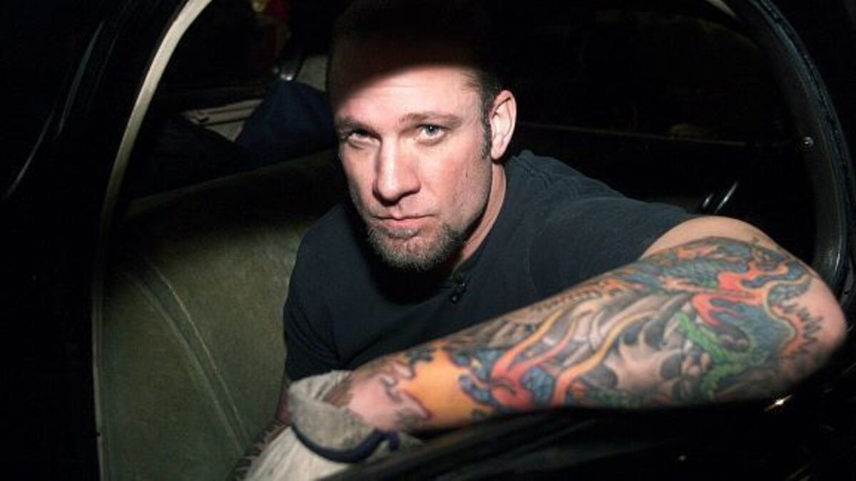 Jesse James tattooed arm profile