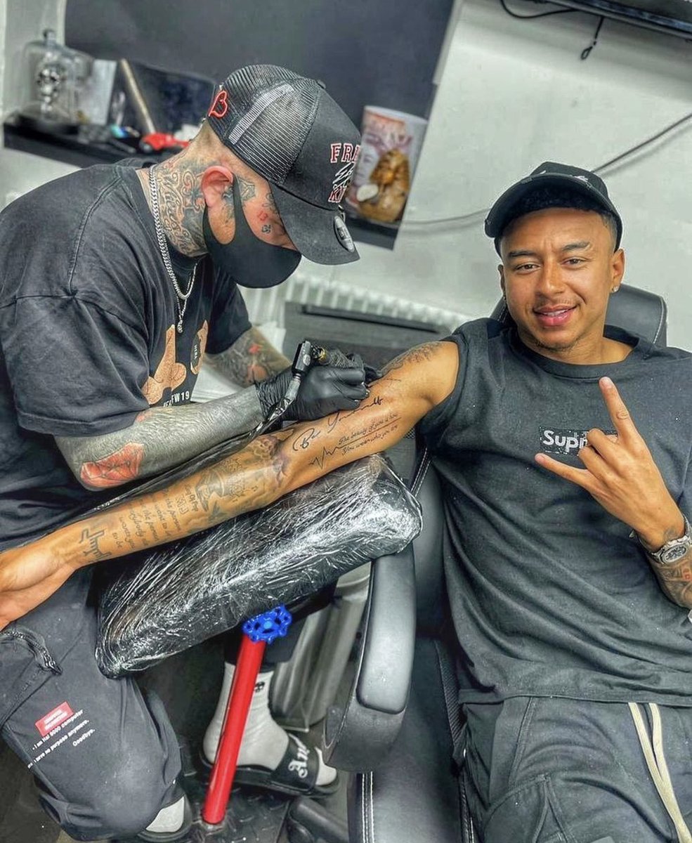 Jesse Lingard tattoos: tattoo studio session showing forearm work