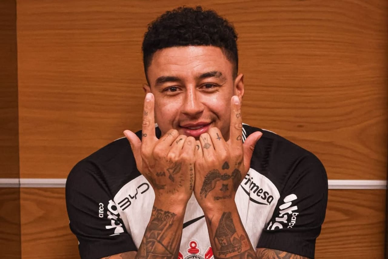 Jesse Lingard tattoos: tattooed arms at club presentation