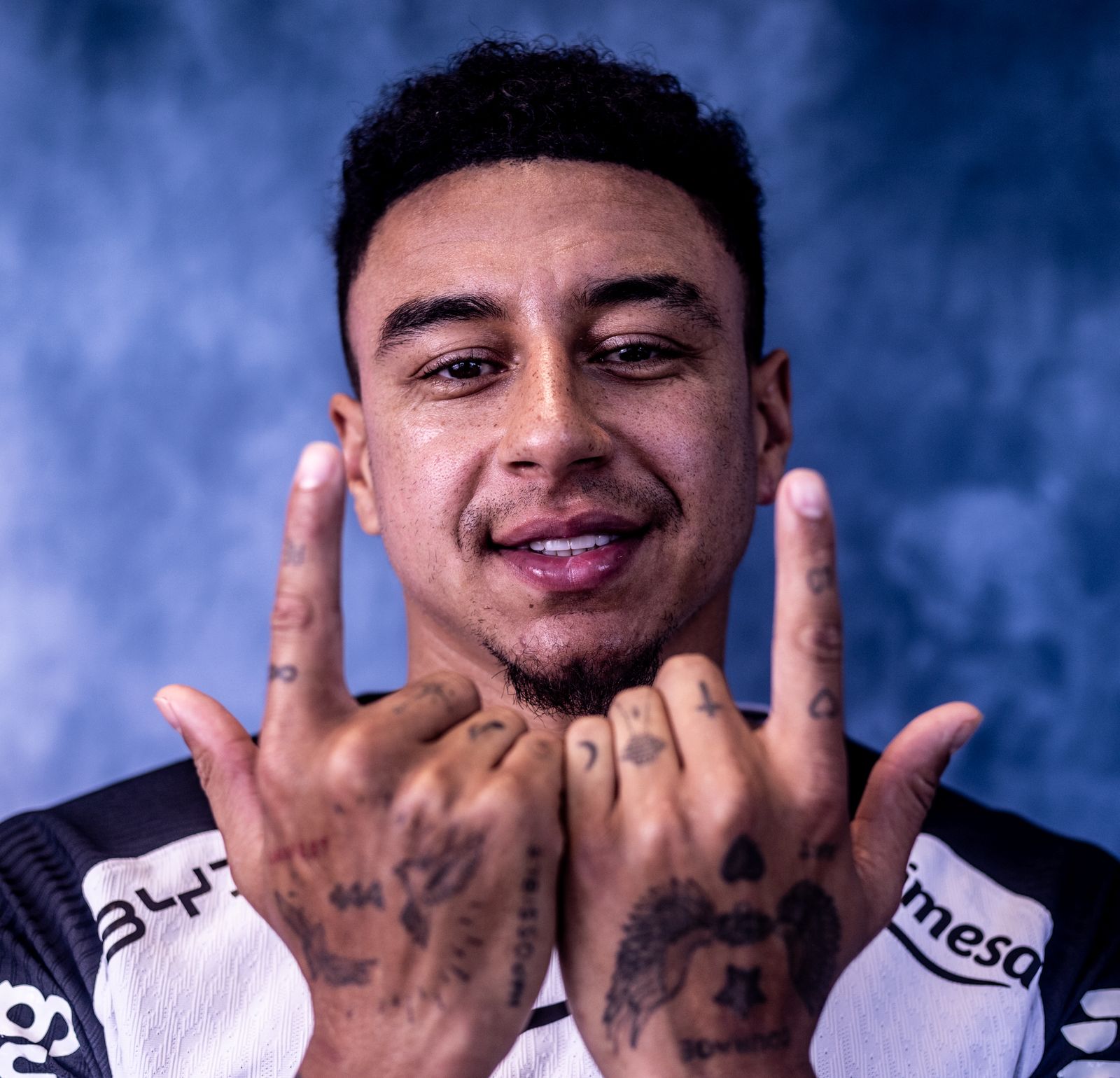 Jesse Lingard tattoos: hand tattoos and forearm coverage