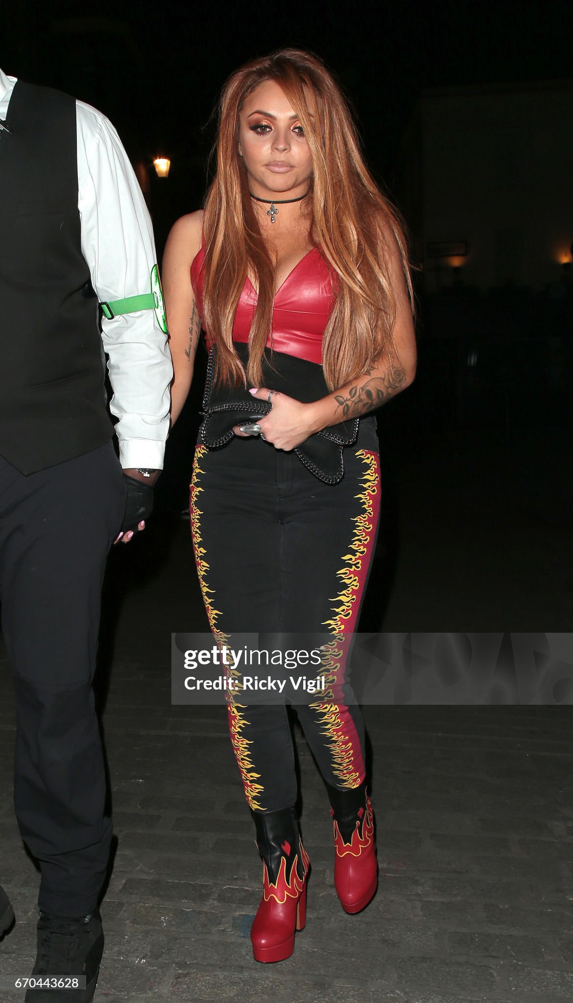 Jesy Nelson tattoos: Jesy Nelson floral arm and torso lettering tattoos