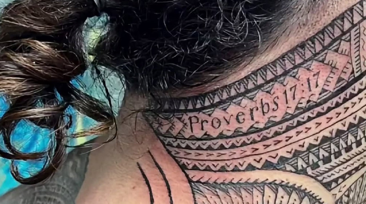 Jey Uso Proverbs 17:17 neck tattoo