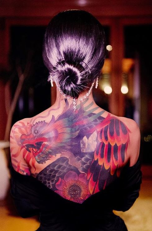Jhene Aiko dragon and phoenix back tattoo
