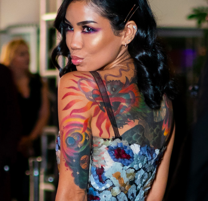 Jhene Aiko dragon and galaxy tattoos
