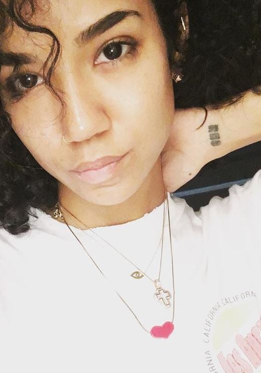 Jhene Aiko neck tattoo