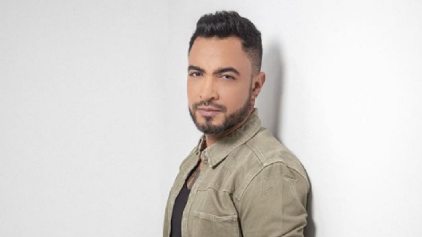 Jhon Álex Castaño in a contextual photograph: Distinct contextual press portrait used for career and identity setting; explicitly not tattoo evidence.; not tattoo evidence