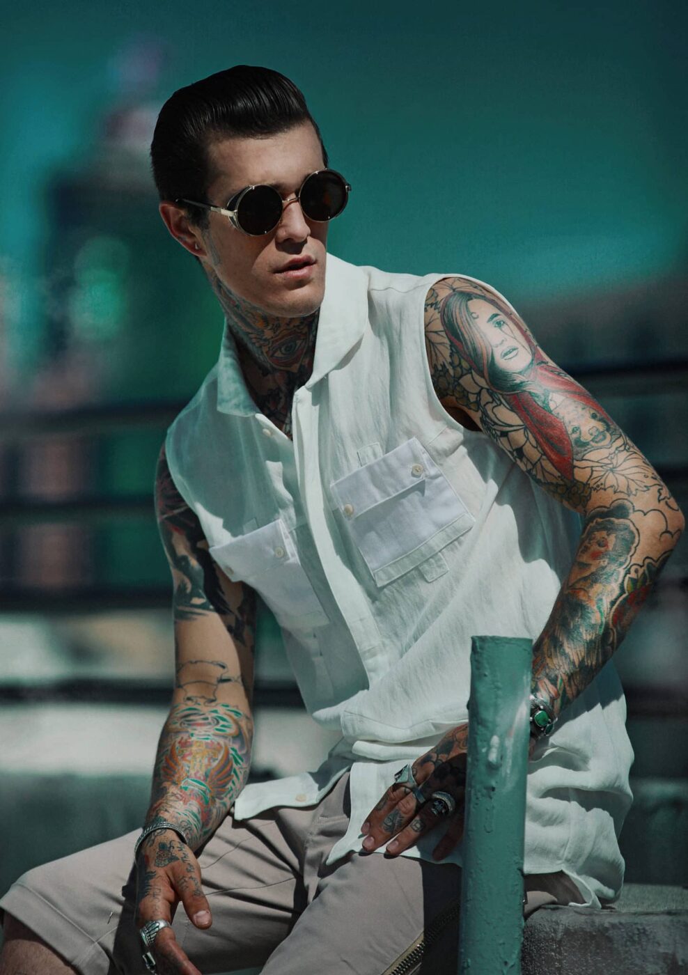 Jimmy Q left upper arm woman portrait tattoo