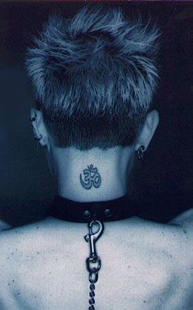 Joan Jett tattoos: Joan Jett tattoo evidence for the section Joan Jett's neck Om tattoo