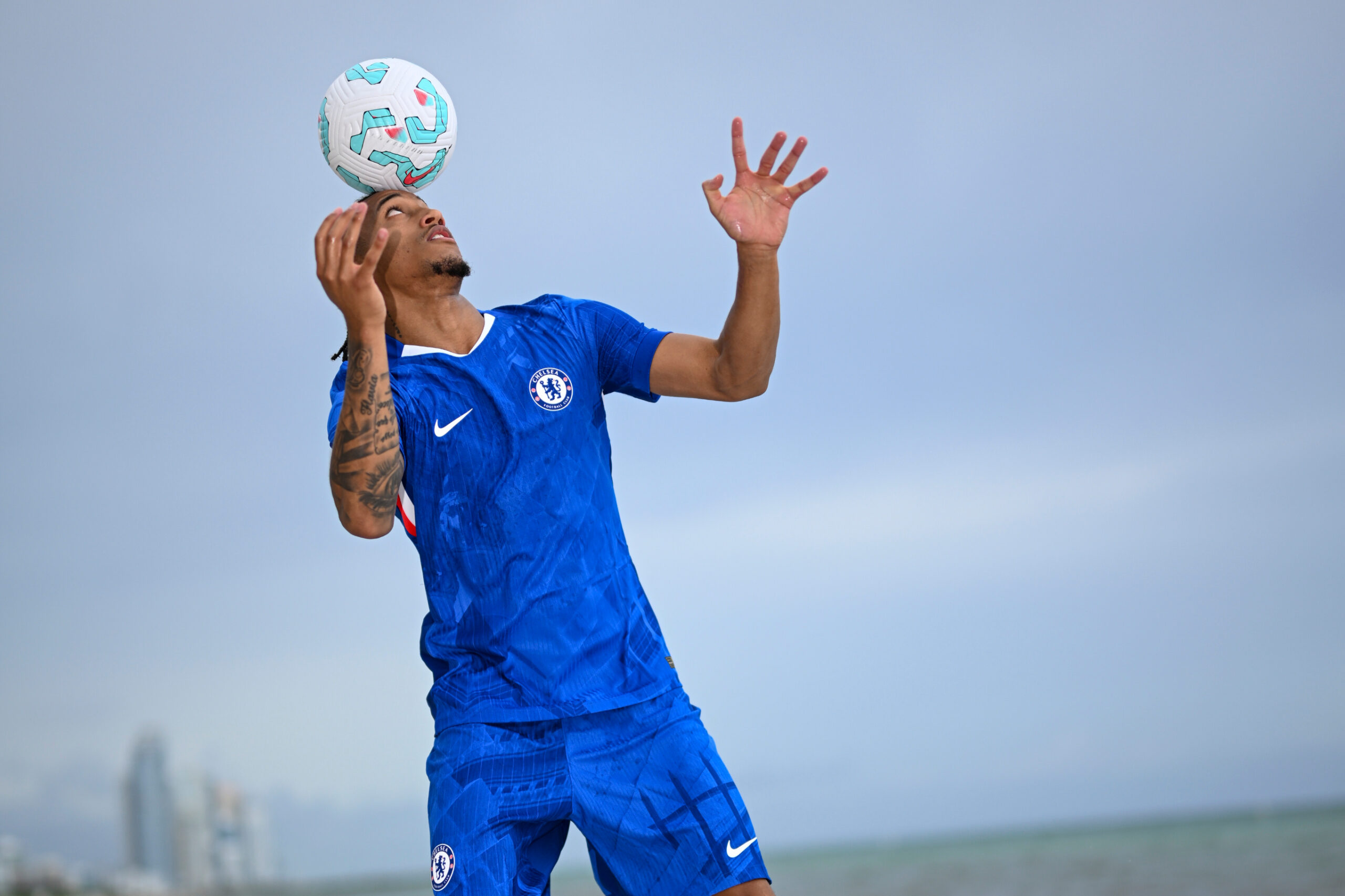 Joao Pedro tattoos: movement view showing how the arm lettering and darker pieces sit when the elbows bend