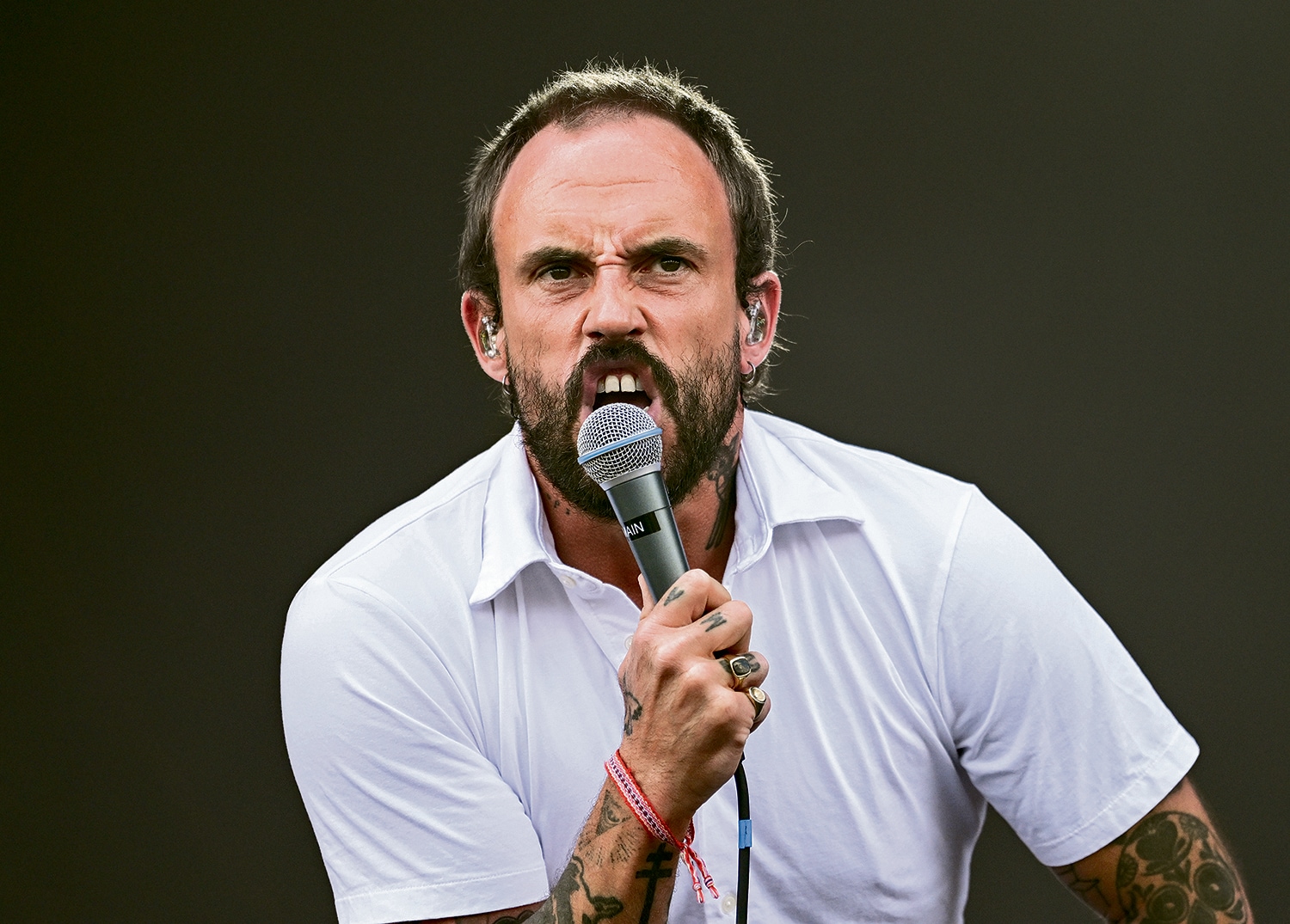 Joe Talbot in a contextual photograph: contextual performance portrait; not tattoo evidence; not tattoo evidence