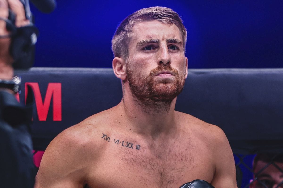 Jonathan Haggerty tattoos: ring-side portrait of the same chest tattoo