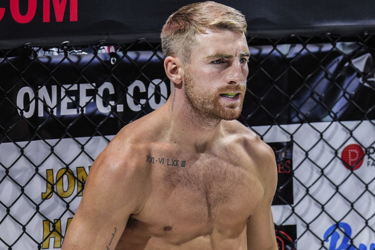 Jonathan Haggerty tattoos: second cage view showing the chest and side detail