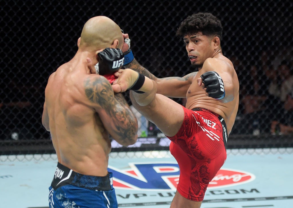 Jonathan Martinez in a contextual photograph: Career context: facing Jose Aldo in Rio; not tattoo evidence