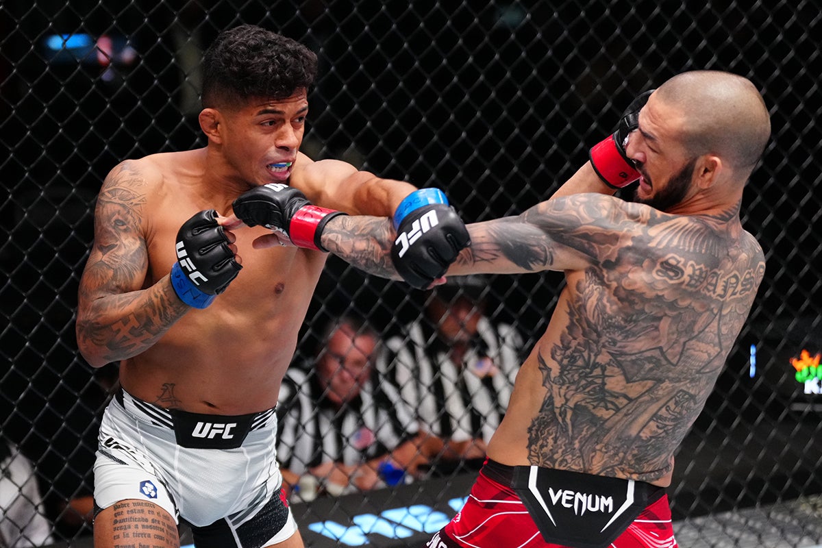 Jonathan Martinez tattoos: The lion and lettering on his right arm