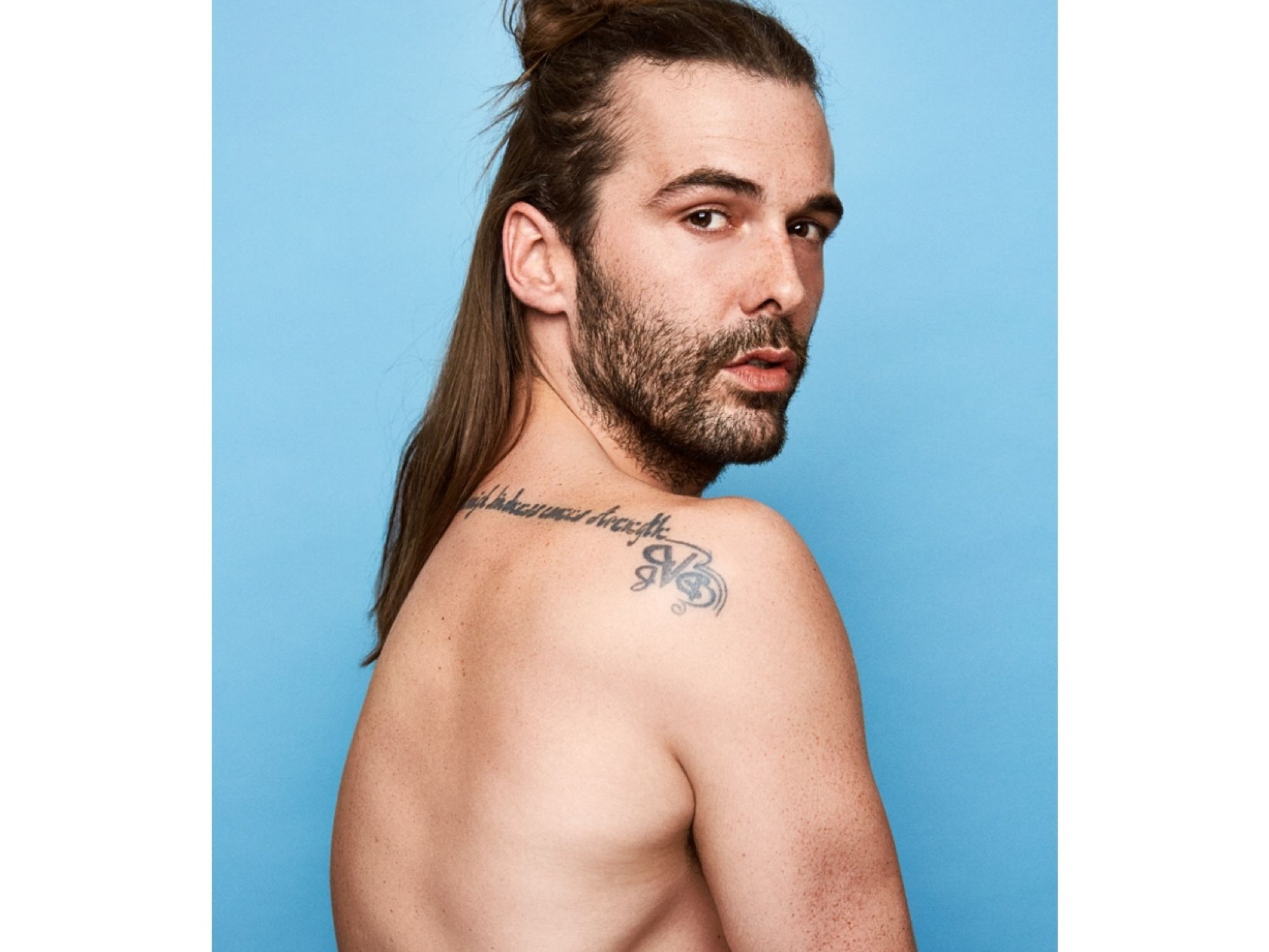 Jonathan Van Ness Clear shoulder-blade script tattoo view in the section about the visible tattoo Jonathan Van Ness tattoos: Clear shoulder-blade script tattoo view in the section about the visible tattoo