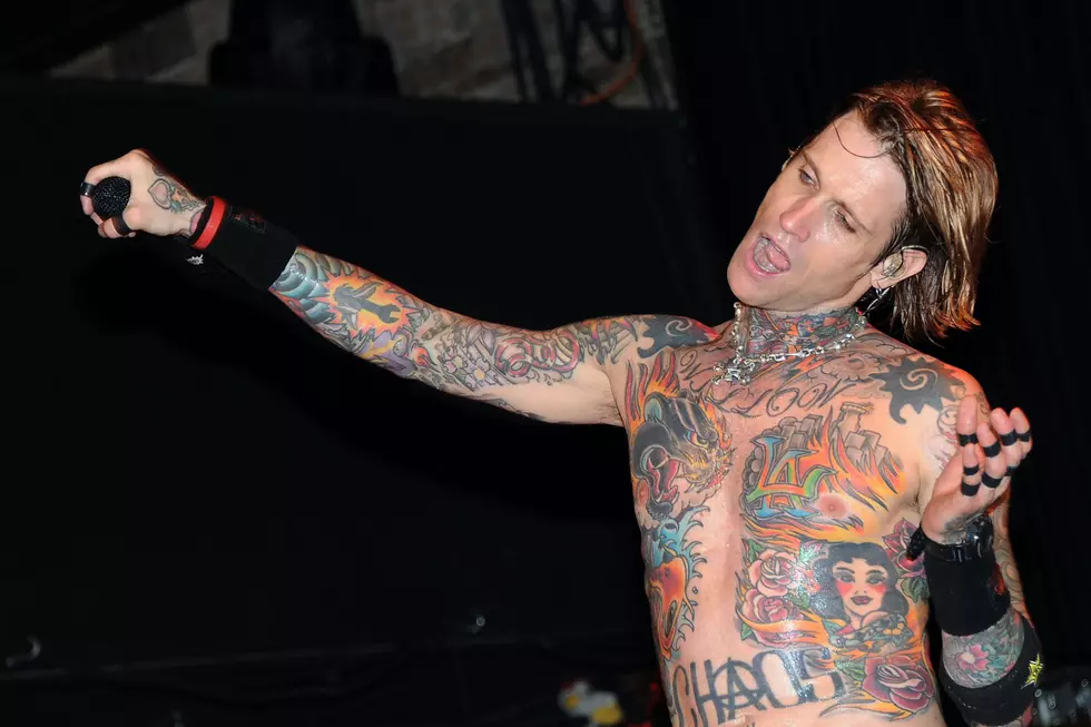 Josh Todd full tattooed arms