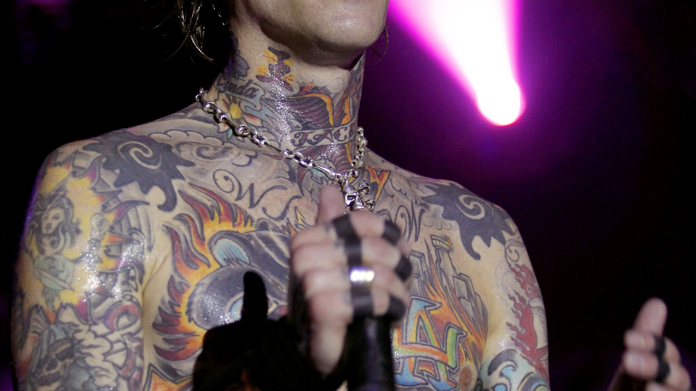 Josh Todd neck and chest tattoos