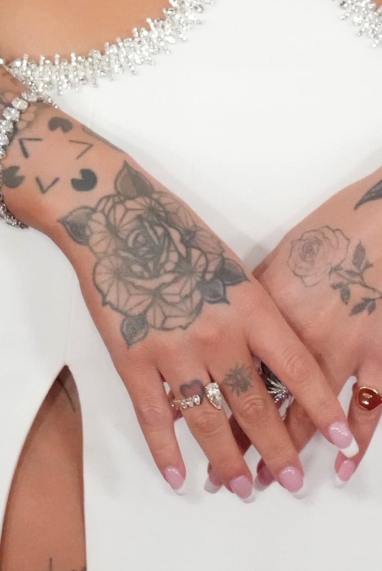 Julia Michaels right hand rose tattoo
