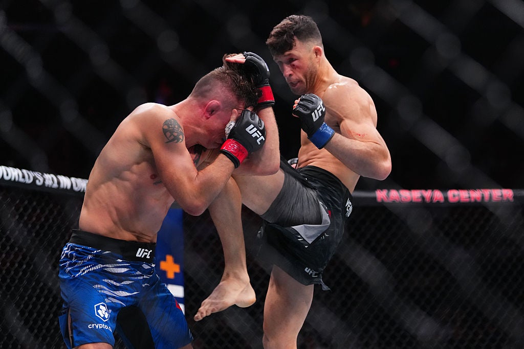 Julian Erosa in a contextual photograph: The Elkins fight in Miami; not tattoo evidence