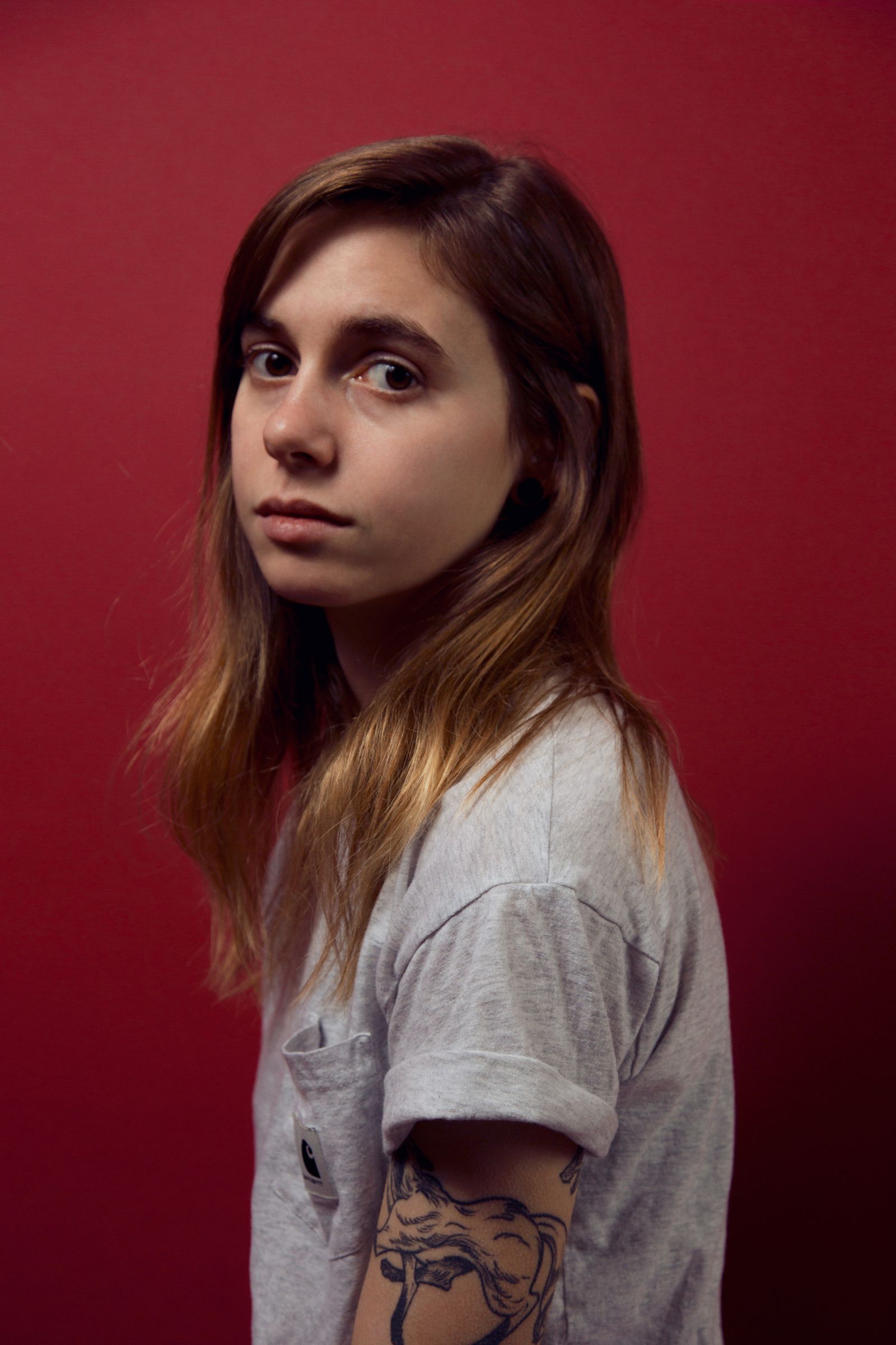 Julien Baker tattoos: Inline tattoo image for the arm-collection section.
