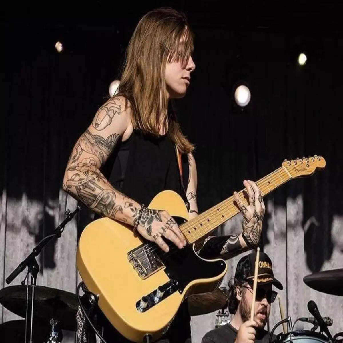 Julien Baker tattoos: Inline tattoo image for the cicada and touring section.