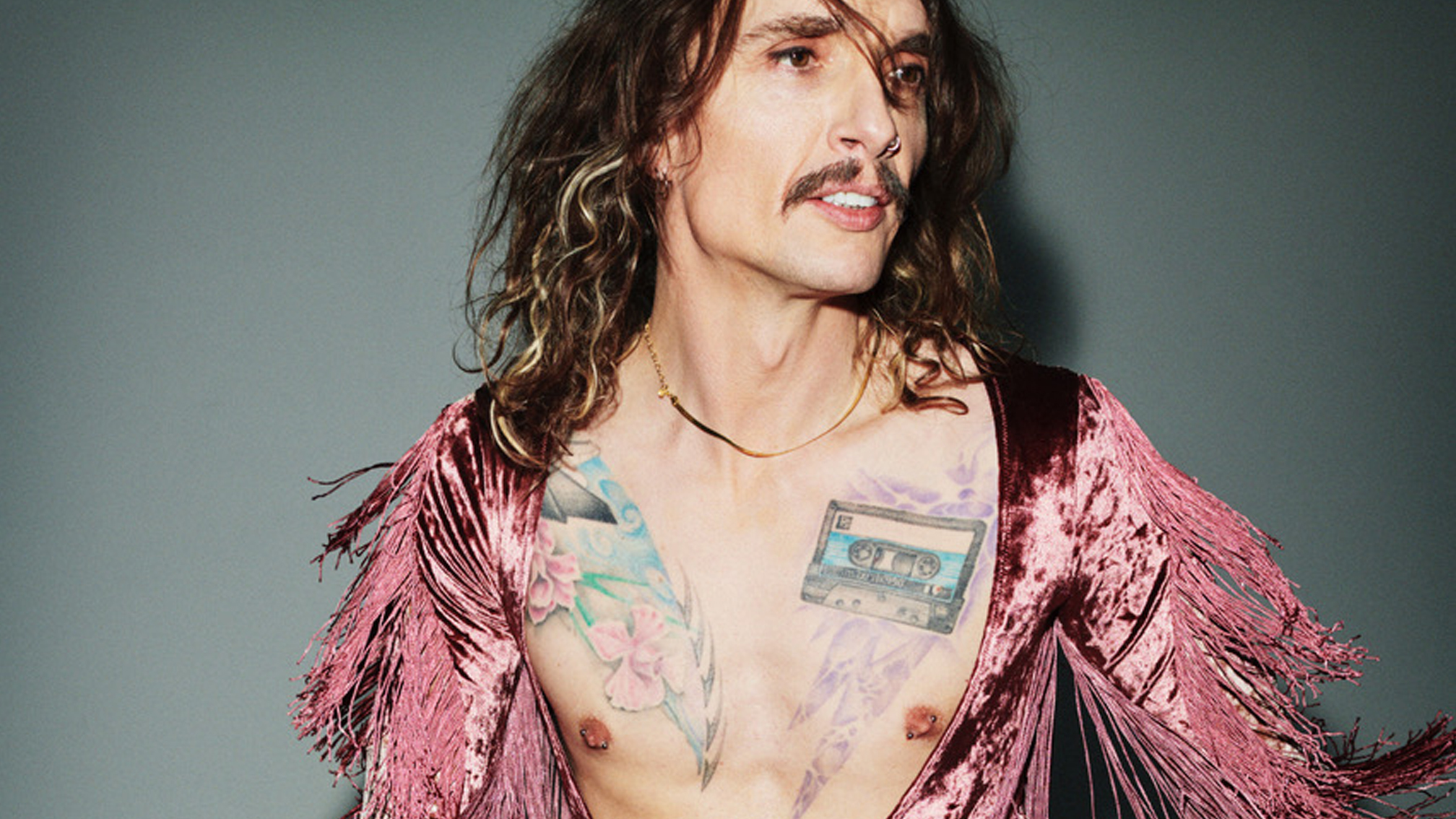 Justin Hawkins tattoos: Justin Hawkins Queen hand section image