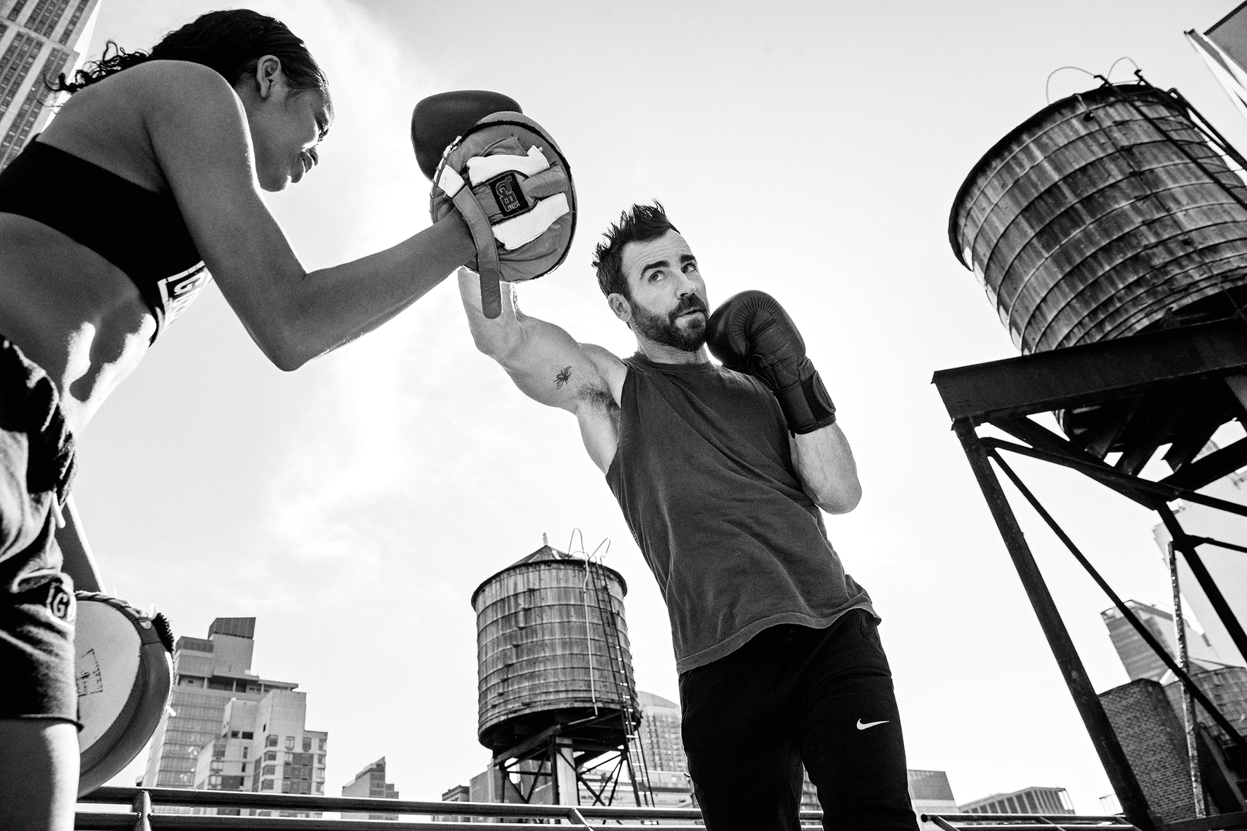 Justin Theroux tattoos: Genuine high-resolution Men's Health editorial photograph with a small tattoo visible near the underarm.