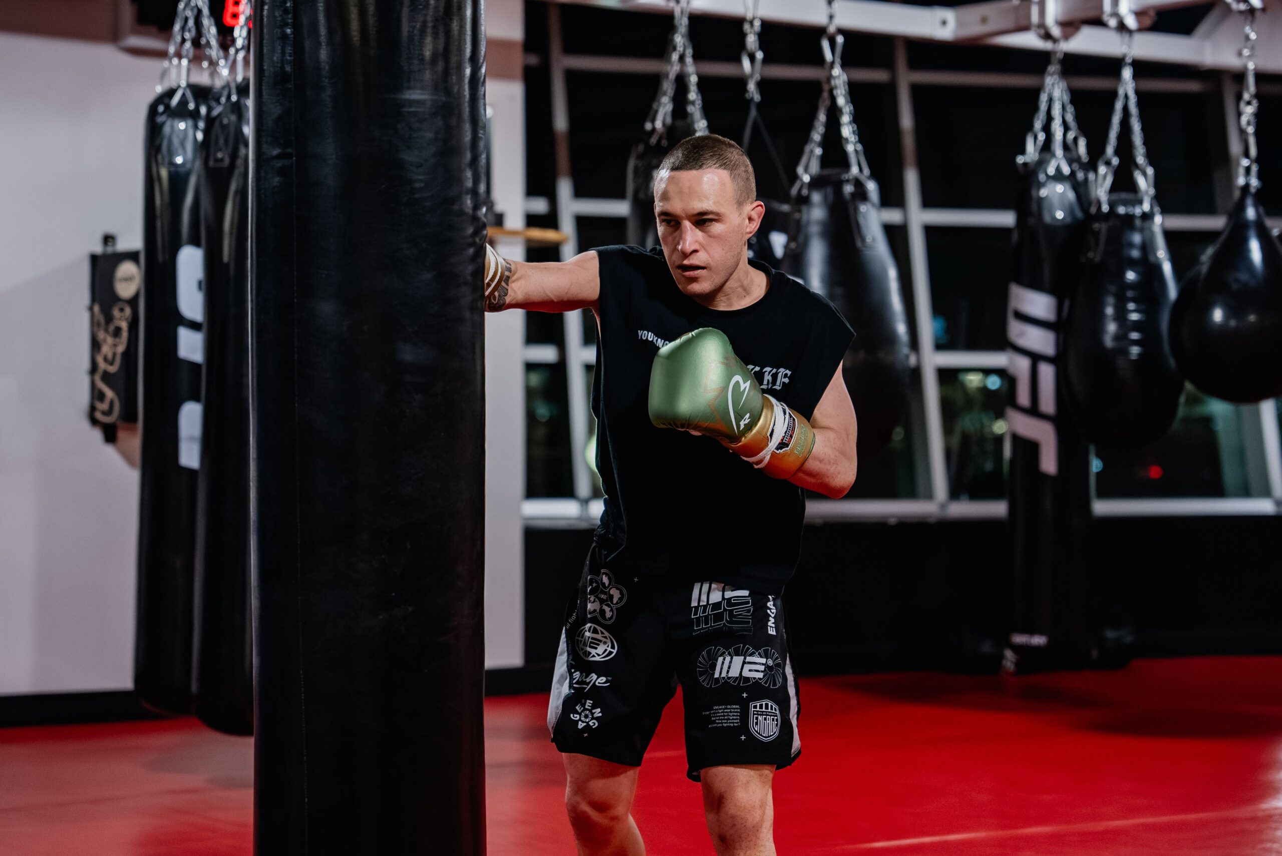 Kai Kara-France Heavy-bag training at the Performance Institute Kai Kara-France in a contextual photograph: Heavy-bag training at the Performance Institute; not tattoo evidence
