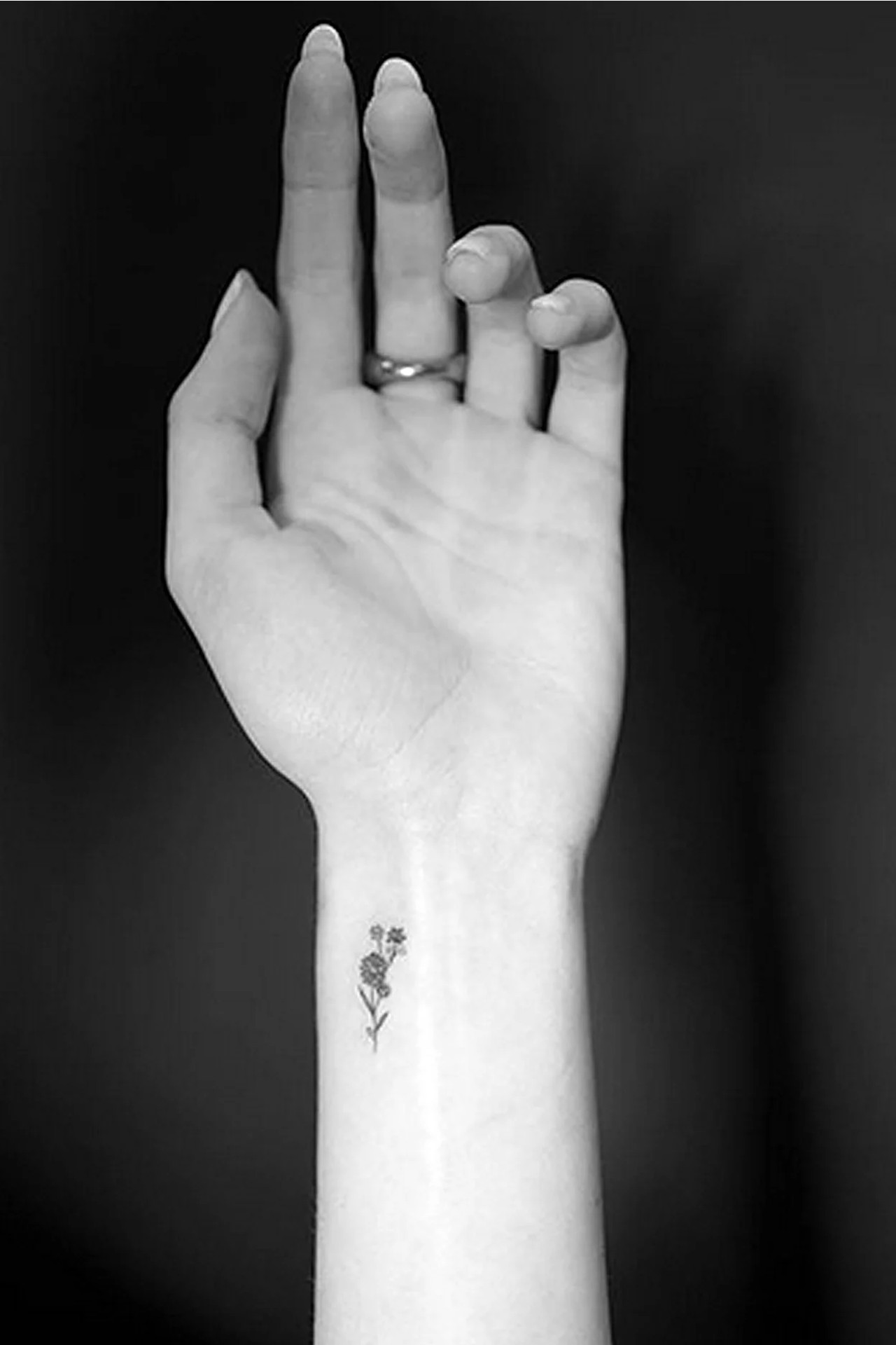 Kaia Gerber tattoos: A small flower on the wrist