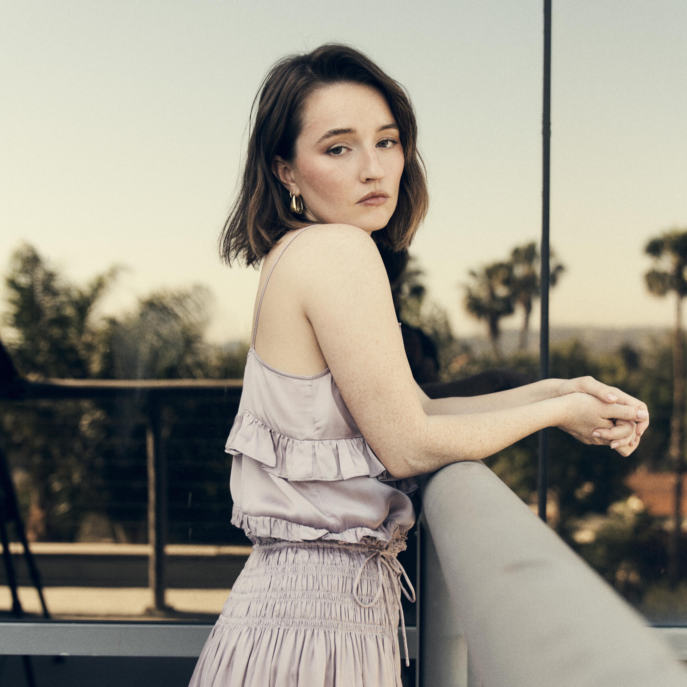 Kaitlyn Dever in a contextual photograph: contextual portrait only, not tattoo evidence; not tattoo evidence