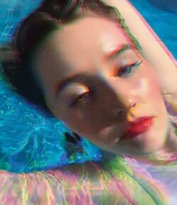 Kaitlyn Dever Tattoos: Her Quiet Roman Numeral Side Tattoo