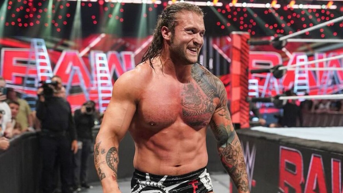 Karrion Kross tattoos: Karrion Kross arm lettering and symbols