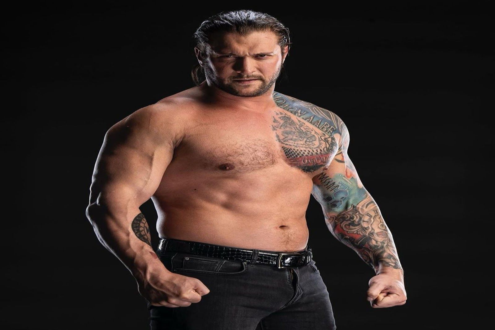 Karrion Kross tattoos: Karrion Kross shoulder and arm sleeve tattoos