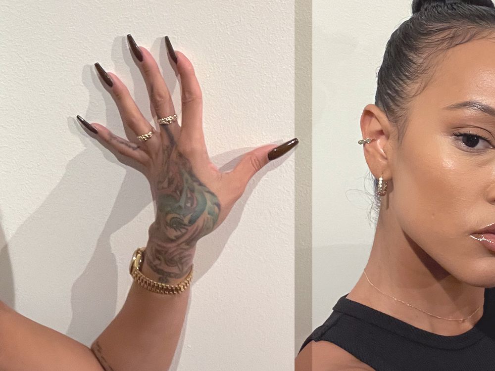 Karrueche Tran tattoos: Chain-like wrist bracelet tattoo and hand ink