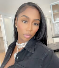 Kash Doll Tattoos: Flowers, Face Star, Wrist Rose and More
