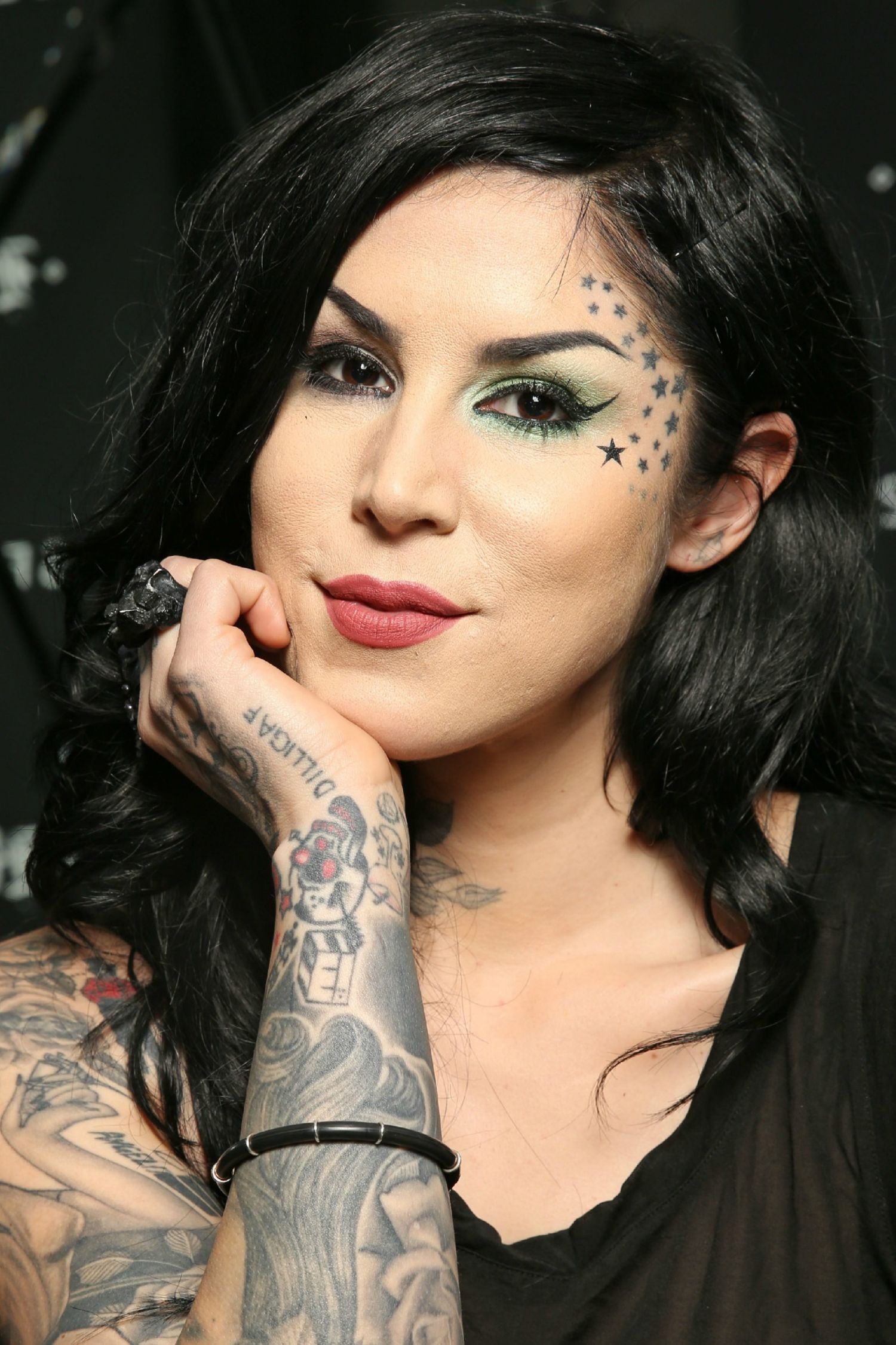 Kat Von D star face and hand tattoos