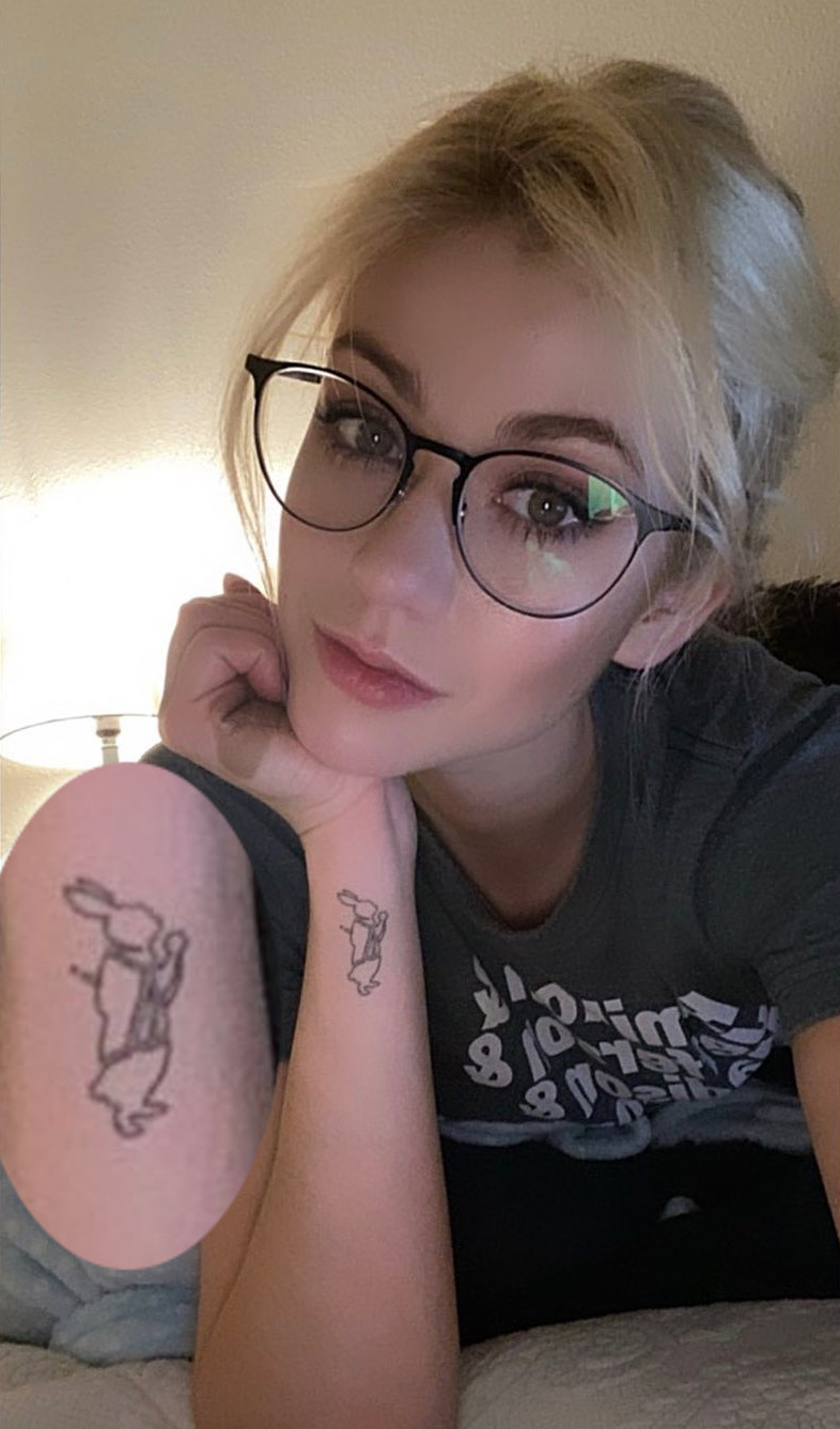 Katherine McNamara tattoos: Photographic evidence of the white rabbit silhouette documented on McNamara’s wrist.