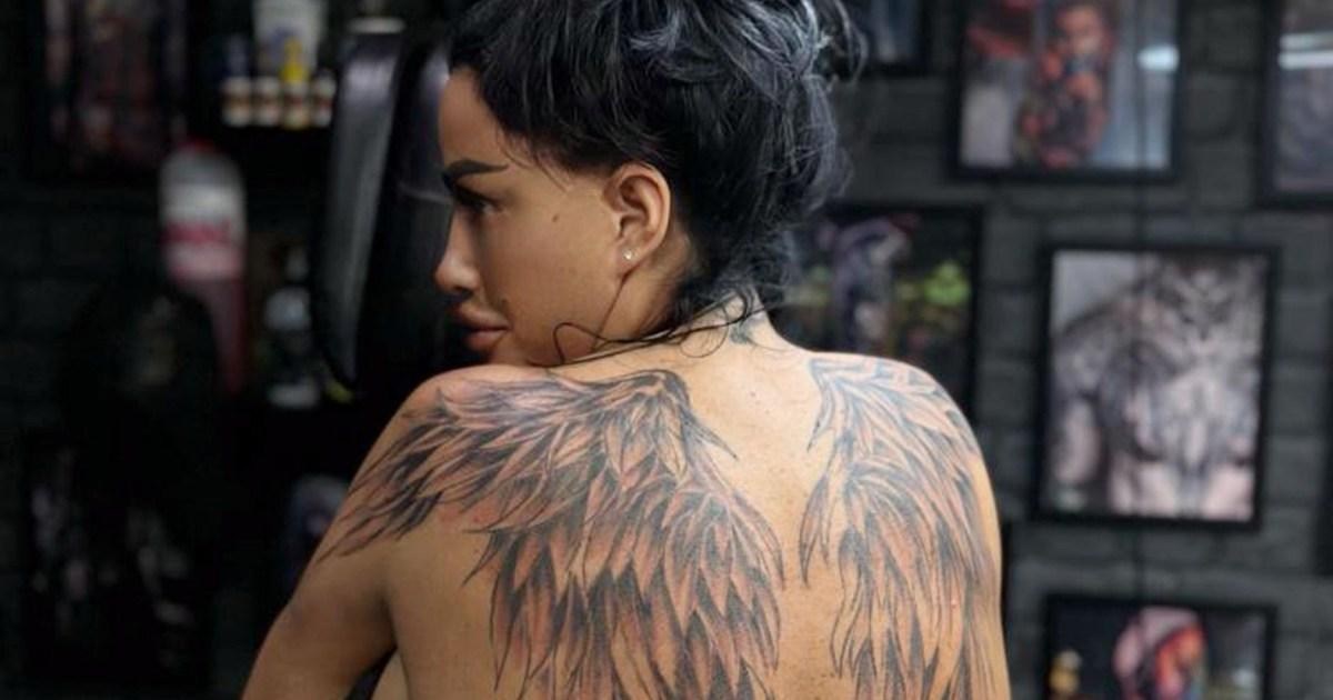 Katie Price tattoos: large angel-wing back tattoo across the shoulder blades
