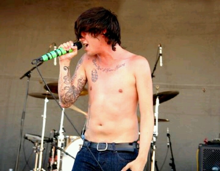 Kellin Quinn chest script tattoo