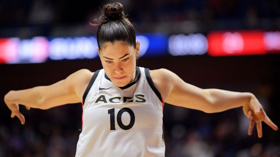 Kelsey Plum in a contextual photograph: Contextual professional basketball photograph only; not tattoo evidence.; not tattoo evidence