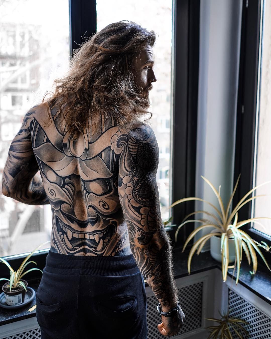 Kevin Creekman tattoos: Full-back grinning samurai and Oni mask with shoulder connections