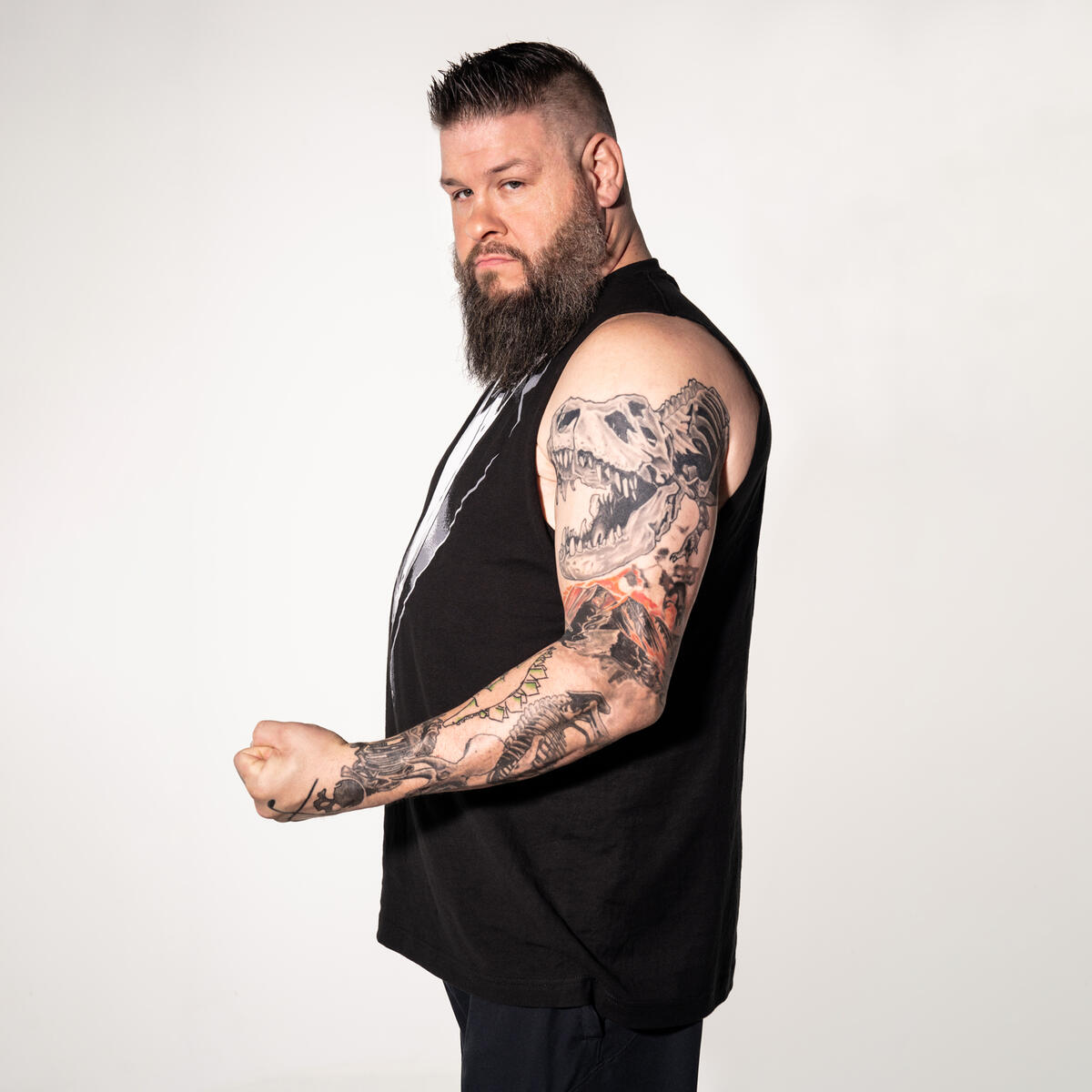 Kevin Owens arm tattoos