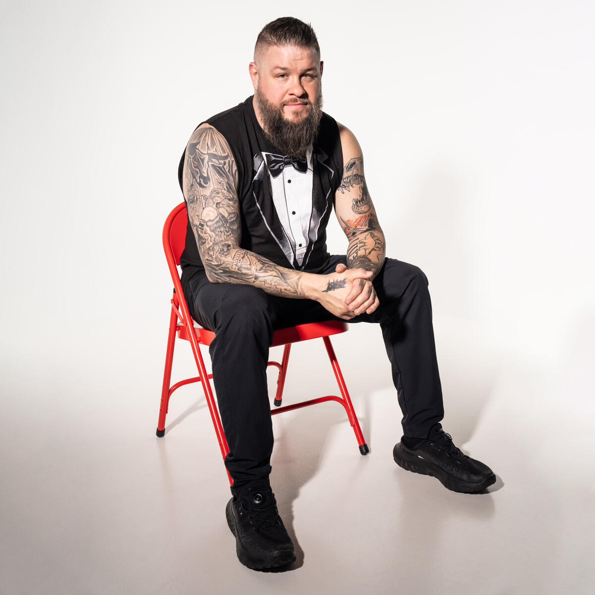 Kevin Owens forearm tattoos