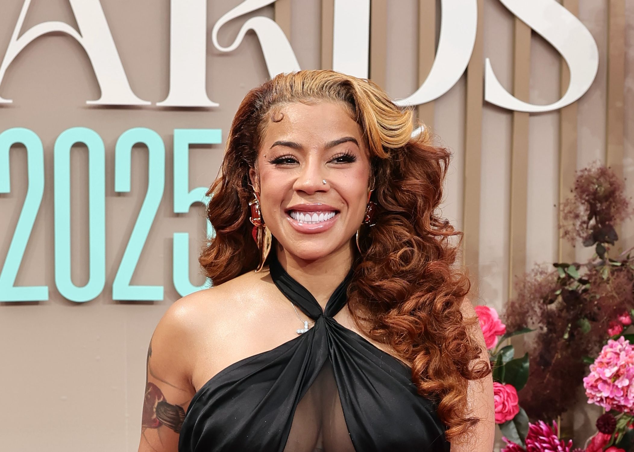 Keyshia Cole tattoos: Keyshia Cole’s reported chest tattoo and later Love cover-up context